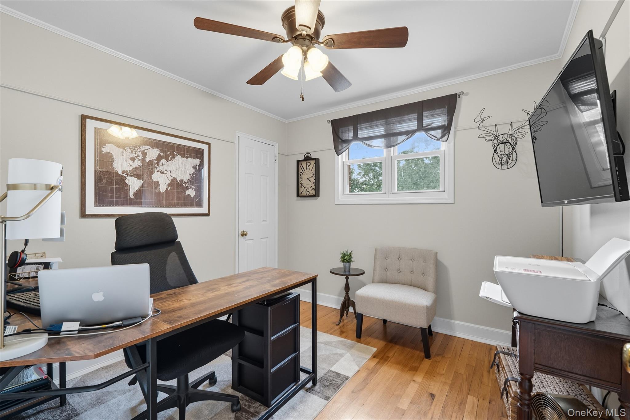 2747 Larkspur Street Yorktown Heights, NY 10598 - Photo 16 of 32 a view of a workspace with furniture window and wooden floor
