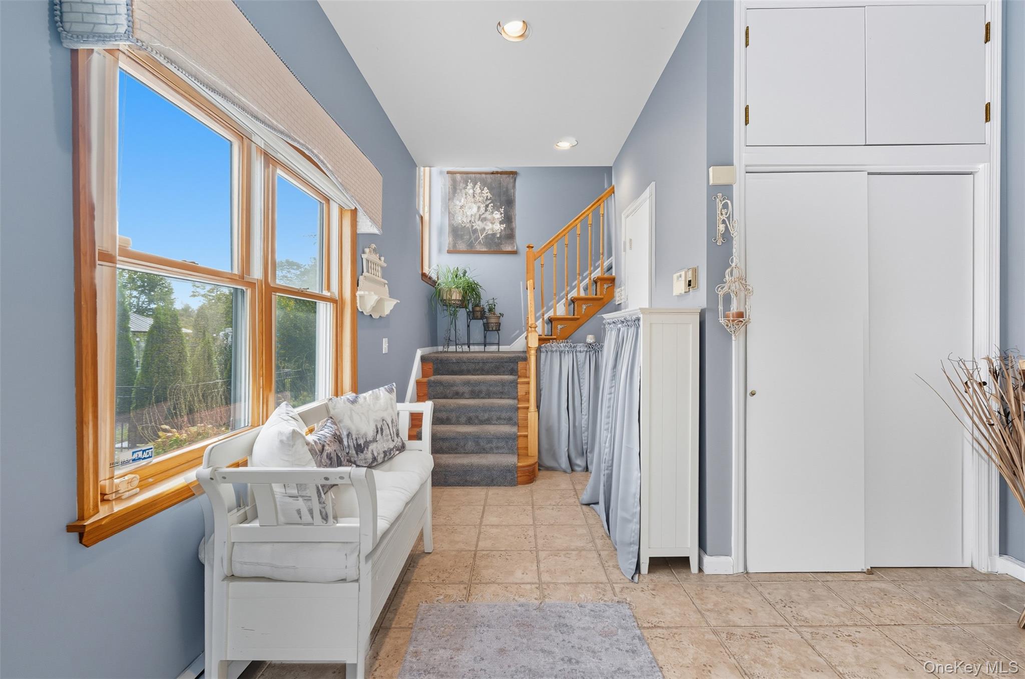 2747 Larkspur Street Yorktown Heights, NY 10598 - Photo 19 of 32 a living room with furniture and a large window