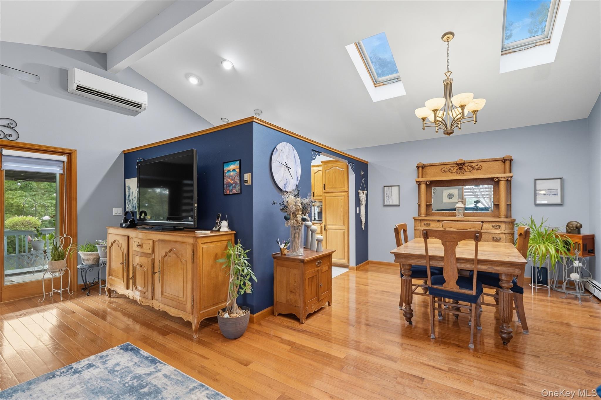 2747 Larkspur Street Yorktown Heights, NY 10598 - Photo 23 of 32 a view of a dining room with furniture window and wooden floor