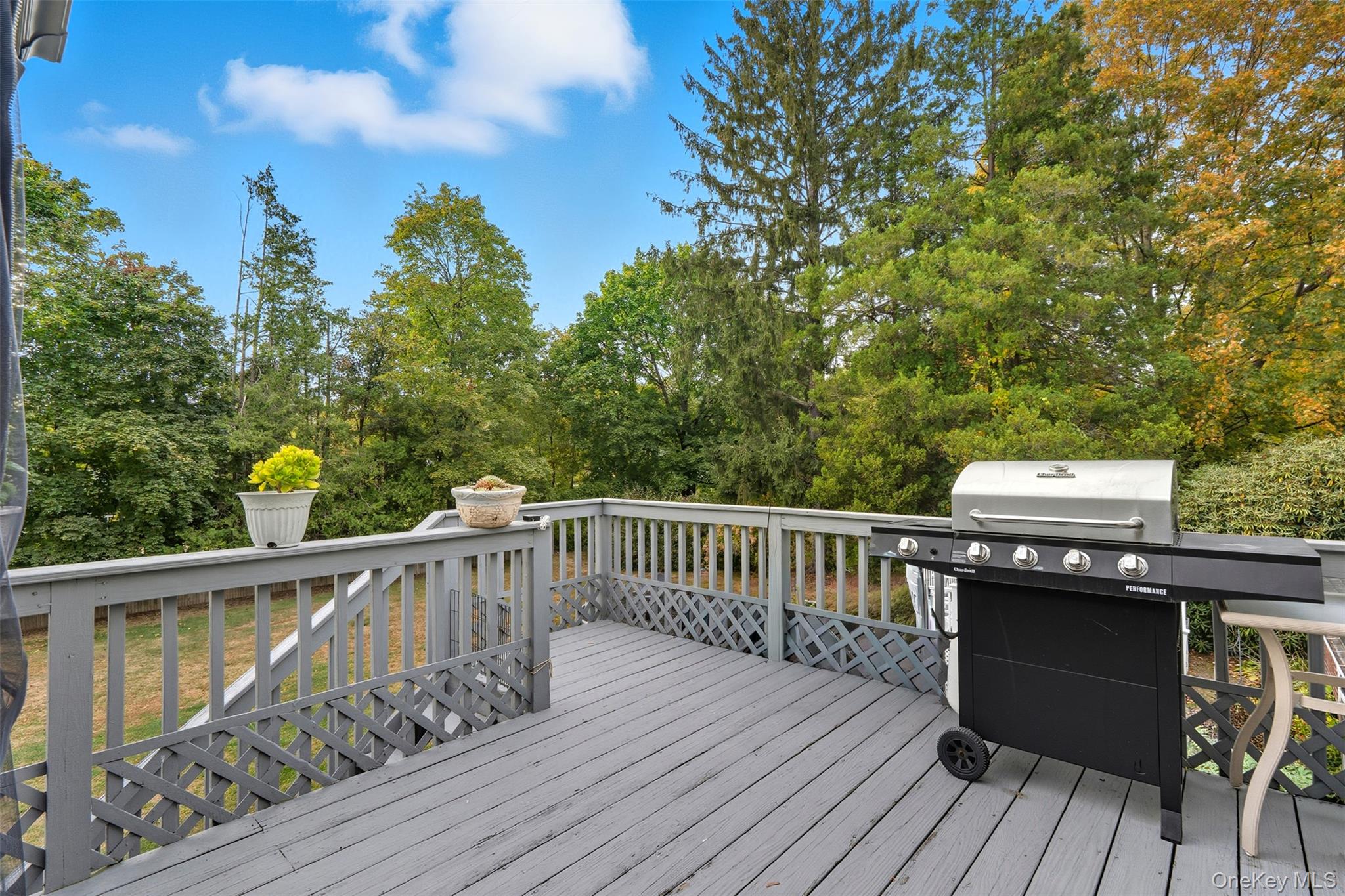 2747 Larkspur Street Yorktown Heights, NY 10598 - Photo 28 of 32 a view of a deck with wooden floor and fence