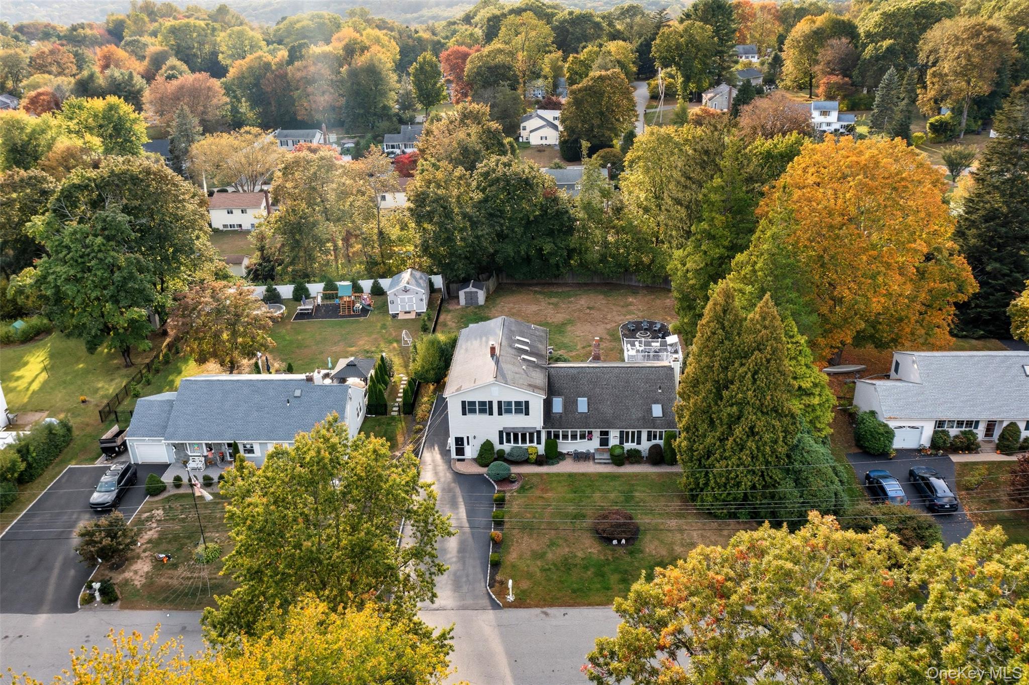 2747 Larkspur Street Yorktown Heights, NY 10598 - Photo 32 of 32 an aerial view of houses with yard