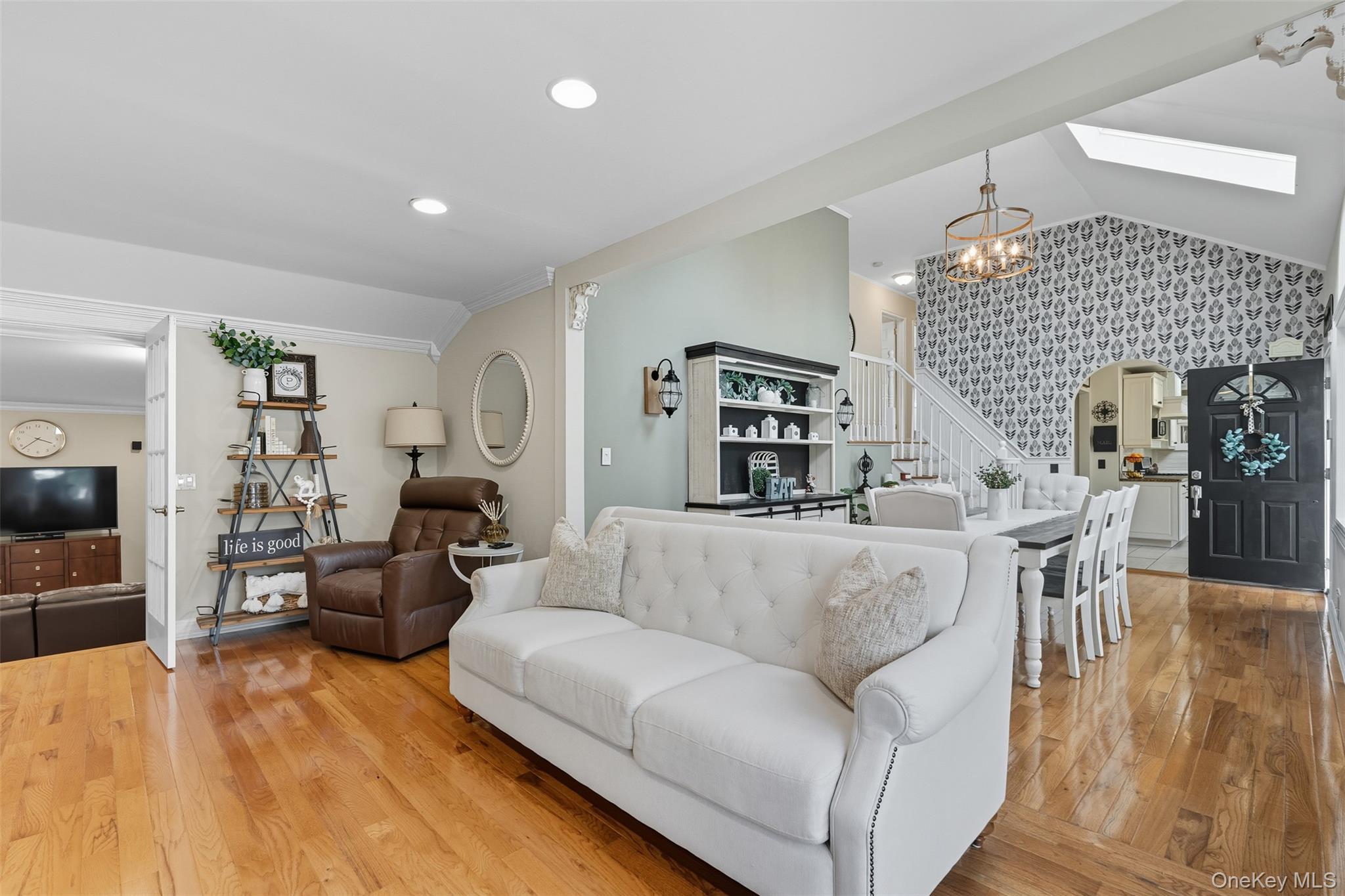 2747 Larkspur Street Yorktown Heights, NY 10598 - Photo 7 of 32 a living room with furniture and a fireplace