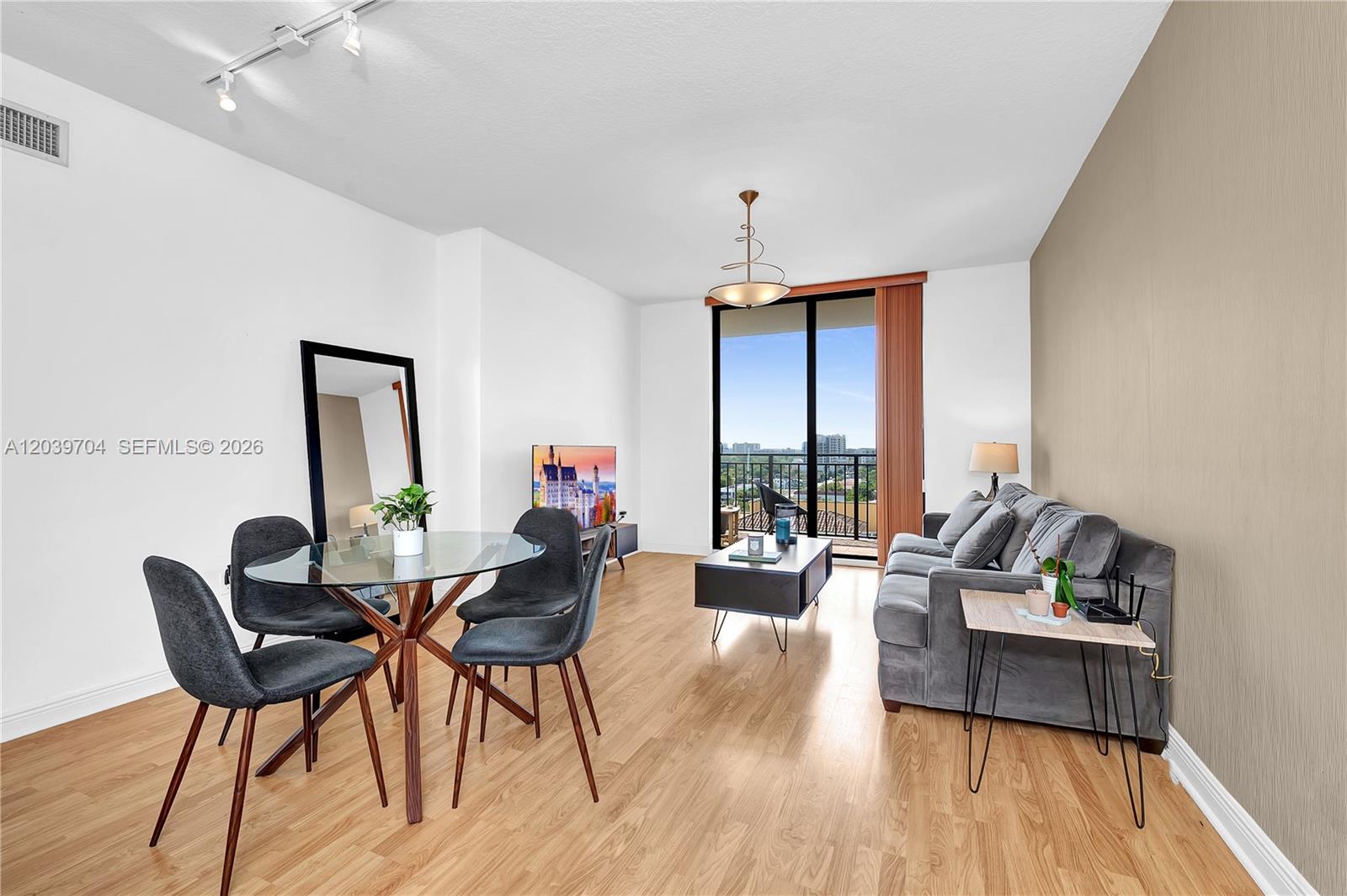 888 Douglas Road, Unit 910 Coral Gables, FL 33134 - Photo 3 of 32 Laminated floors , neutral colors