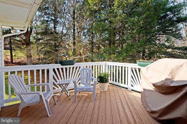 1202 Peachtree Road Fallston, MD 21047 - Photo 17 of 30 a view of balcony with wooden floor and outdoor seating