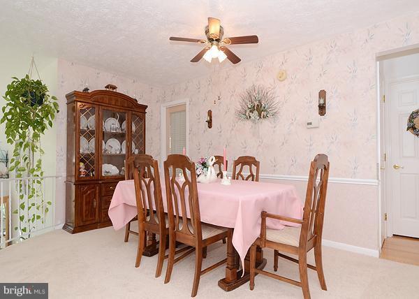 1202 Peachtree Road Fallston, MD 21047 - Photo 7 of 30 a view of a dining room with furniture and chandelier