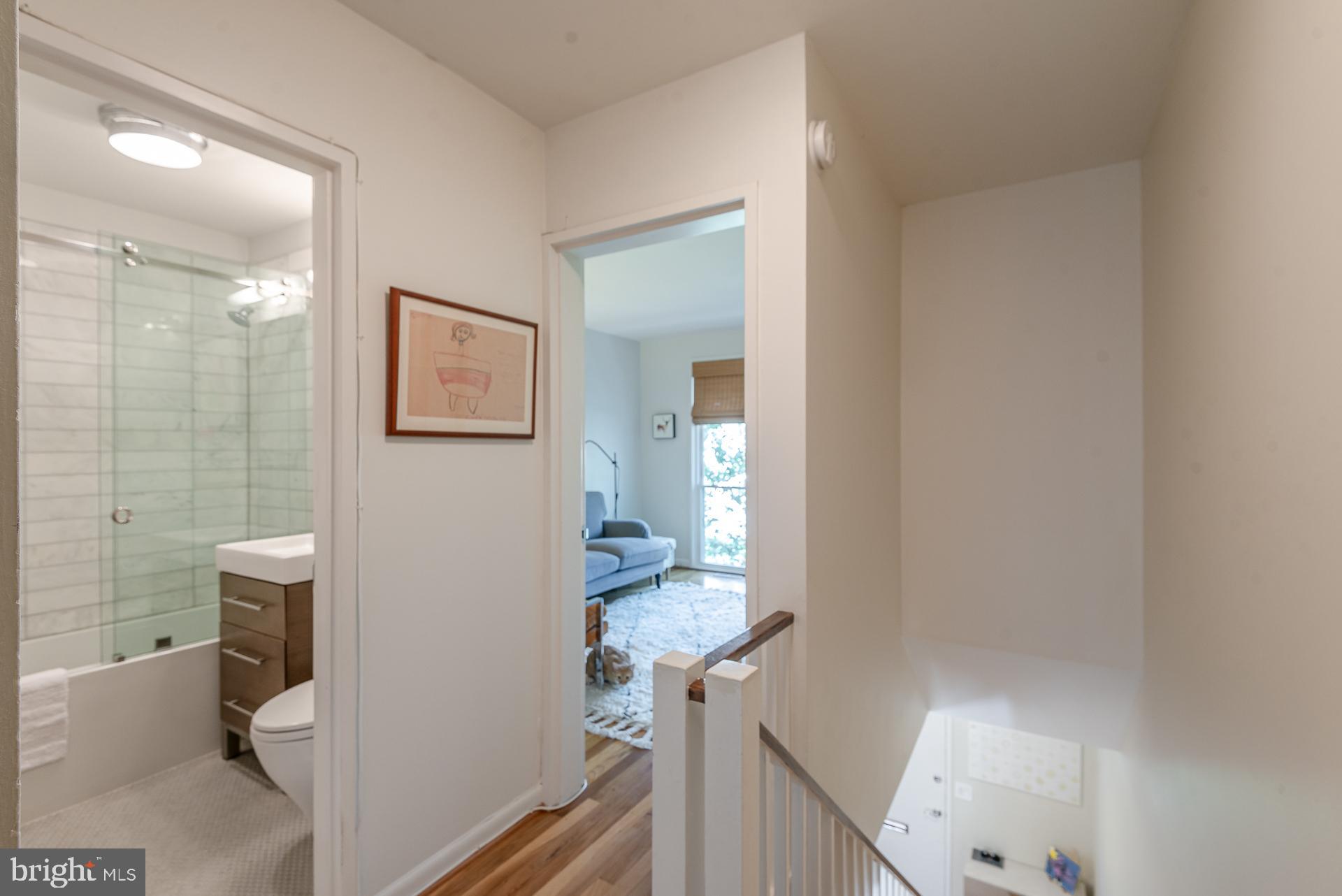 213 G Street Southwest, Unit 132 Washington, DC 20024 - Photo 16 of 27 Full bath with Carrara marble an soaking tub