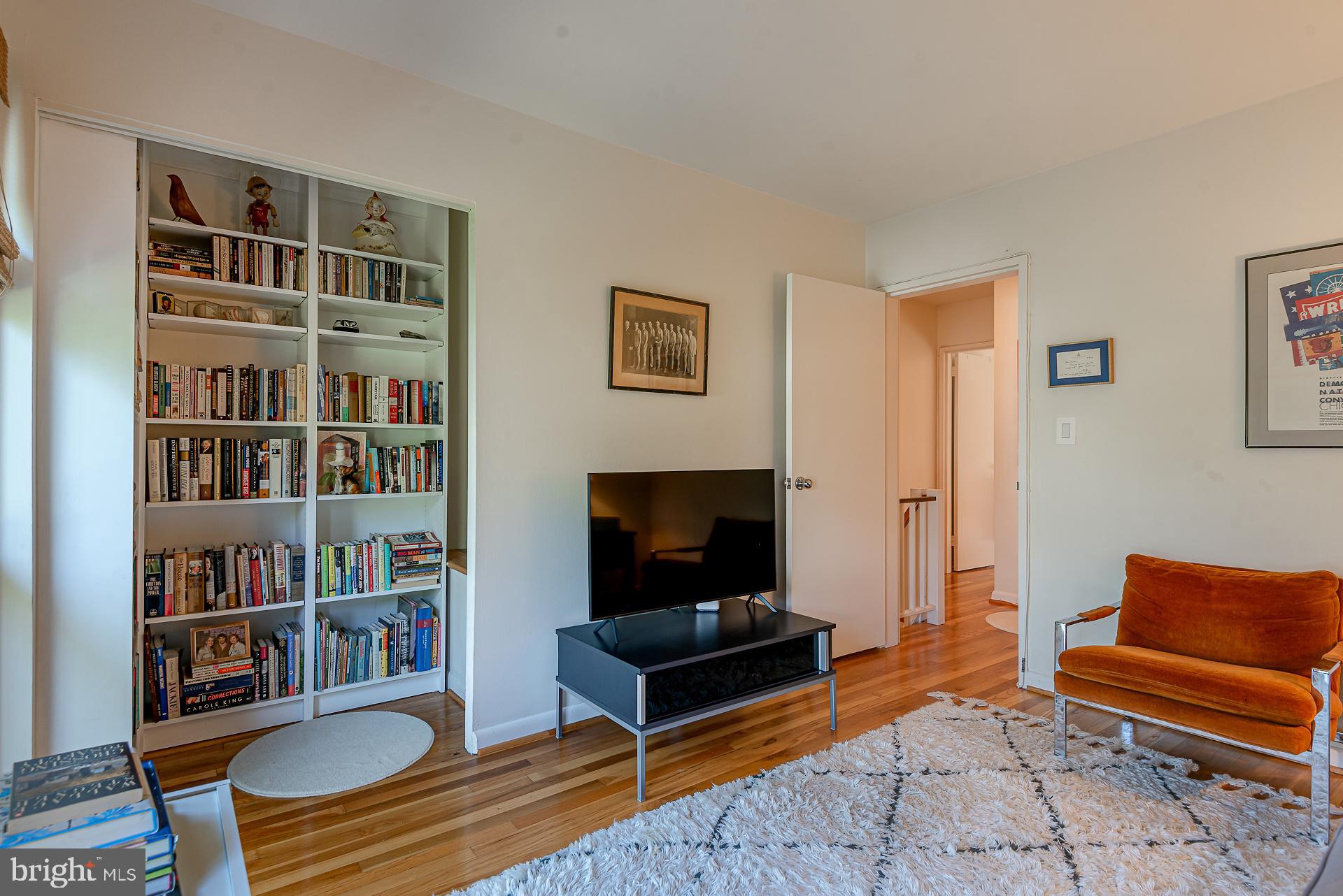 213 G Street Southwest, Unit 132 Washington, DC 20024 - Photo 18 of 27 Closet has been outfitted with bookshelves