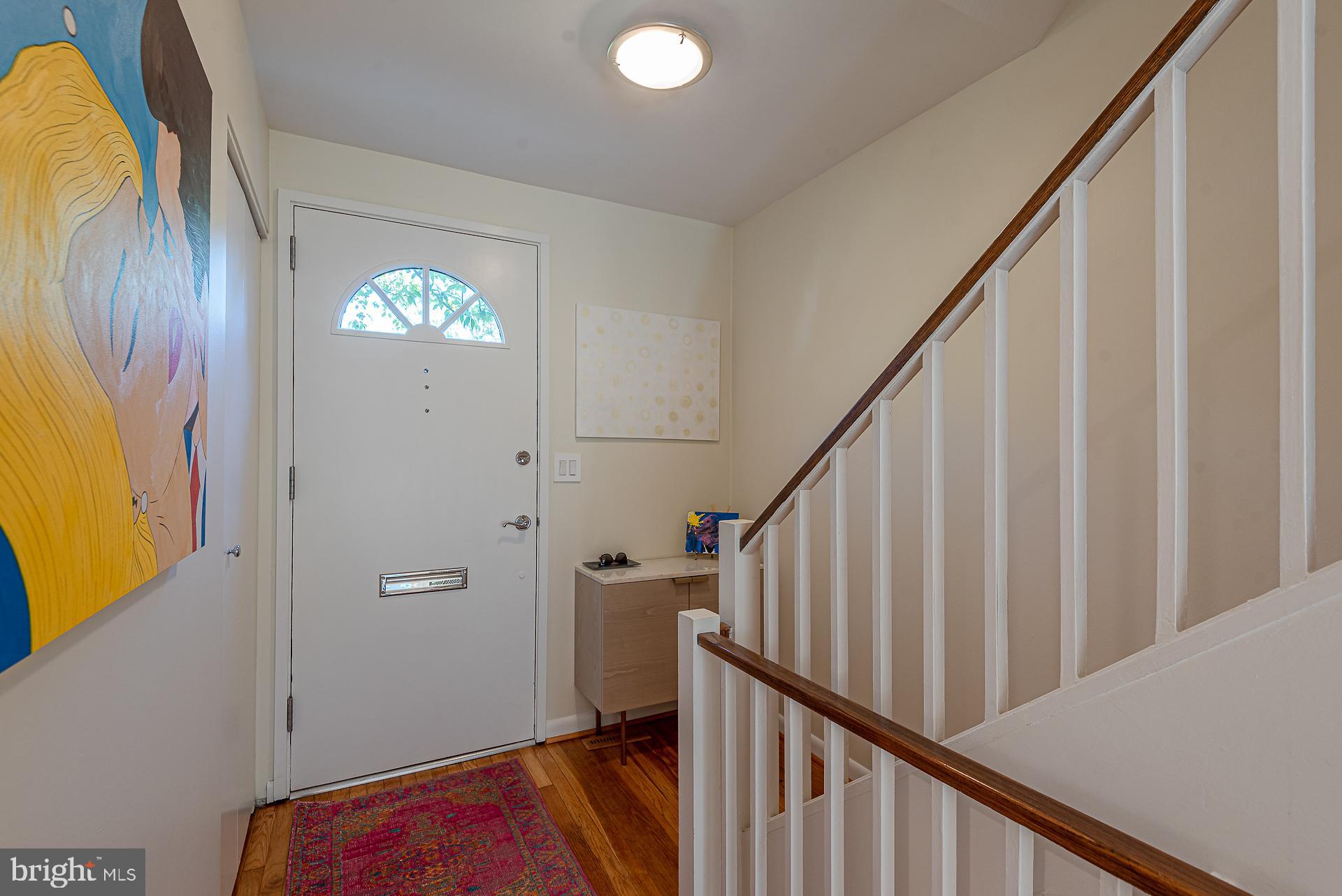 213 G Street Southwest, Unit 132 Washington, DC 20024 - Photo 3 of 27 Entry leads to a Bright open living space