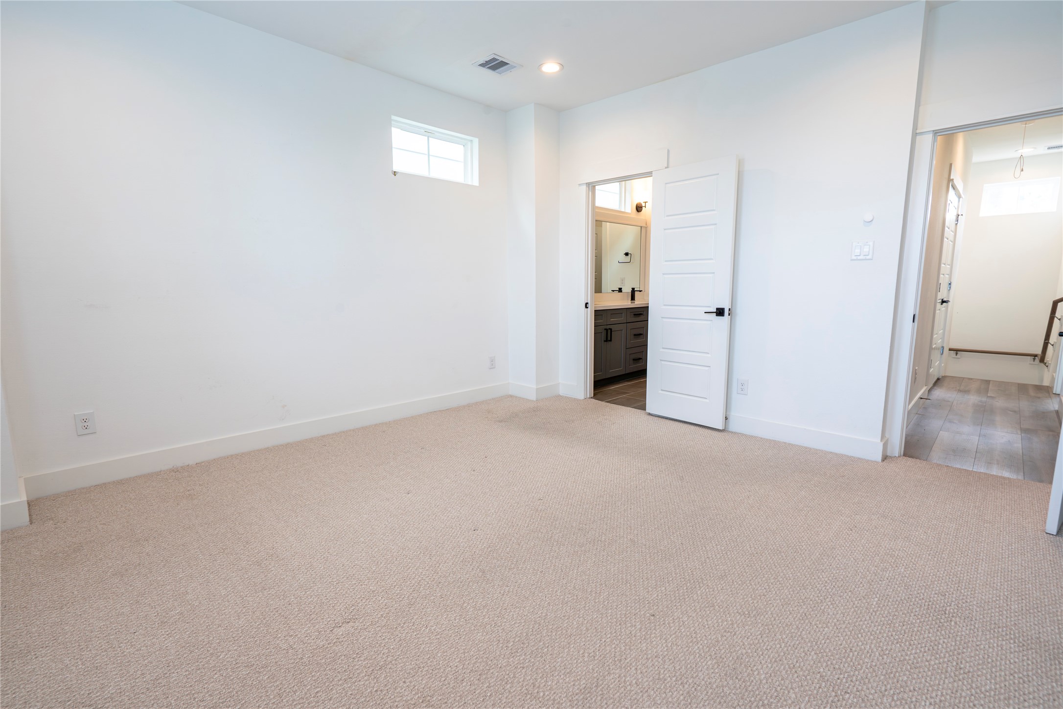 2056 Johanna Drive, Unit F Houston, TX 77055 - Photo 19 of 27 a view of an empty room and a window