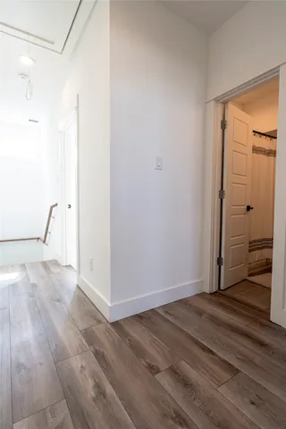 a bathroom with a sink toilet vanity and shower