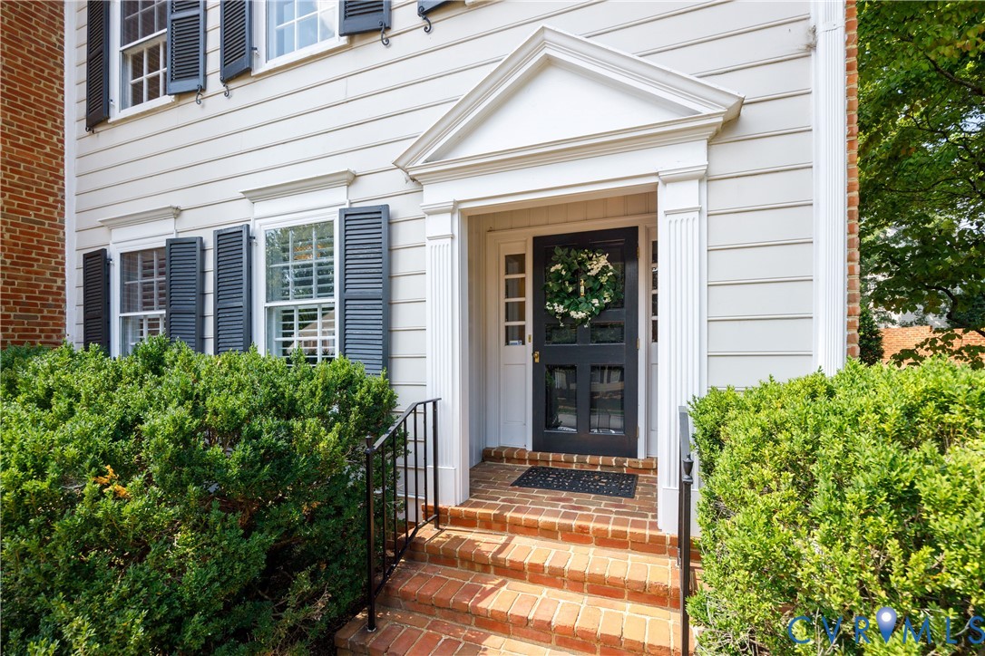 300 North Ridge Road, Unit 97 Henrico, VA 23229 - Photo 2 of 35 Brick steps lead to the covered entry with space t