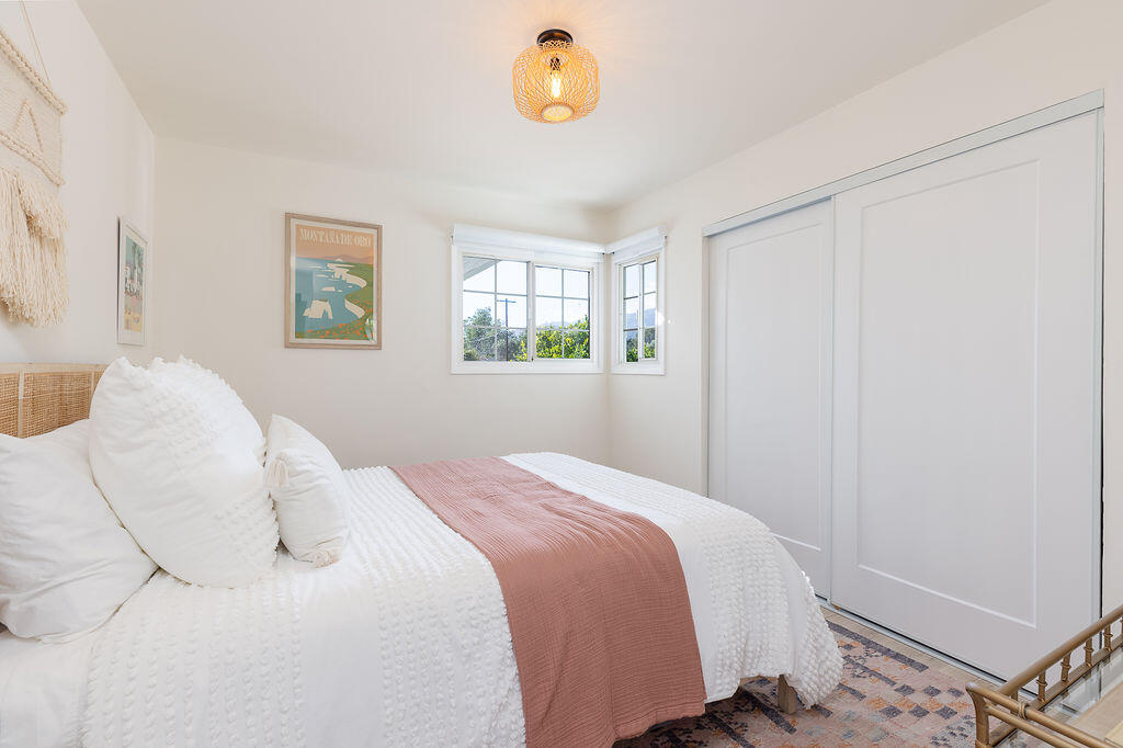 1430 Linhere Drive Carpinteria, CA 93013 - Photo 14 of 34 a bedroom with a bed and a window