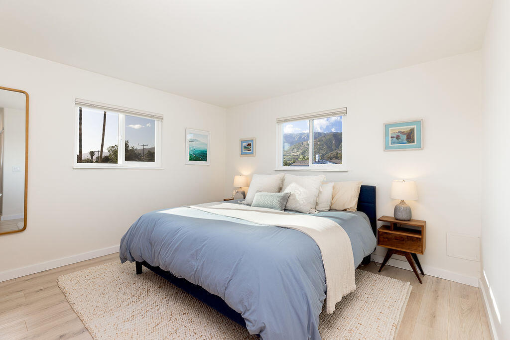 1430 Linhere Drive Carpinteria, CA 93013 - Photo 19 of 34 a bedroom with a bed and a window