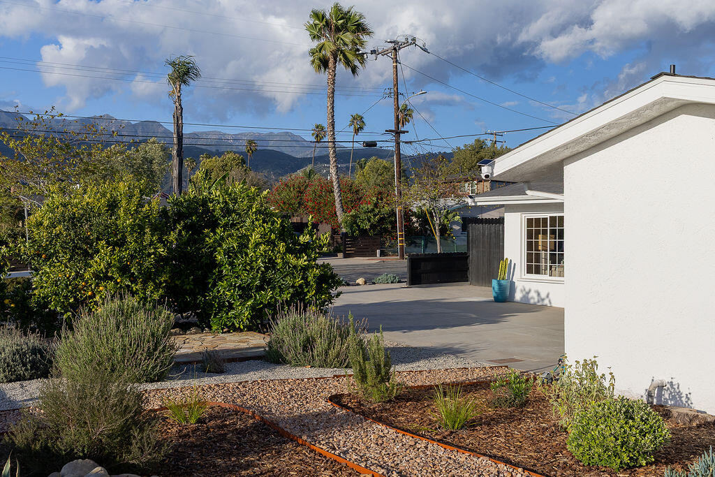 1430 Linhere Drive Carpinteria, CA 93013 - Photo 20 of 34 a front view of a house with garden