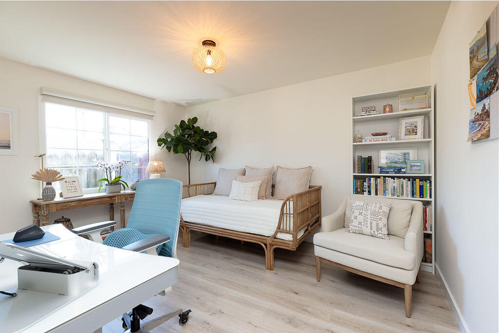 1430 Linhere Drive Carpinteria, CA 93013 - Photo 22 of 34 a living room with furniture and a window