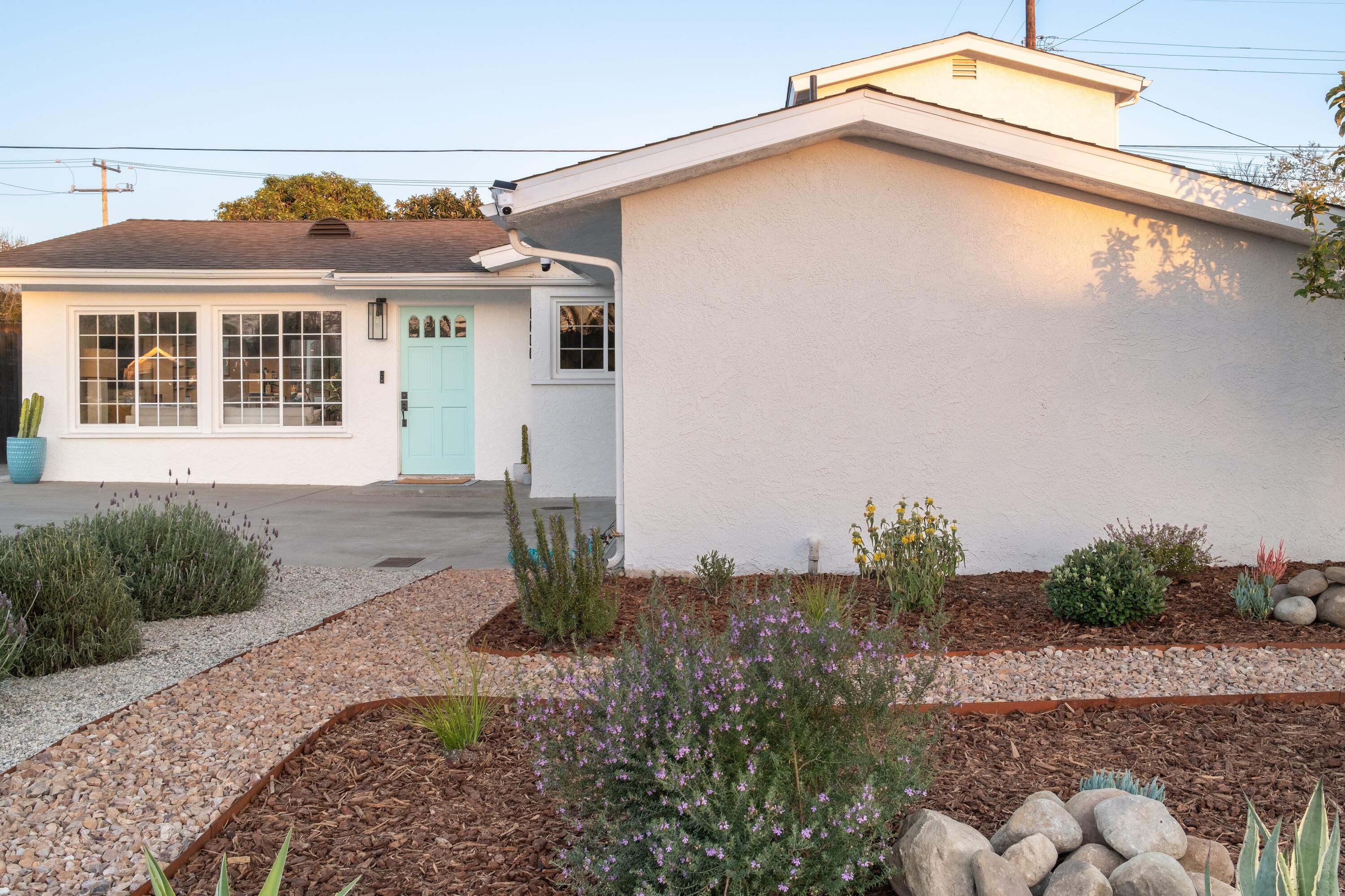 1430 Linhere Drive Carpinteria, CA 93013 - Photo 25 of 34 a front view of a house with a yard