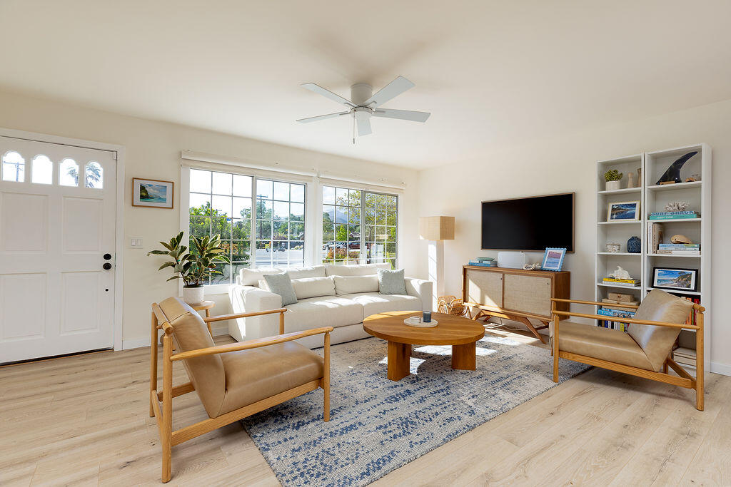 1430 Linhere Drive Carpinteria, CA 93013 - Photo 5 of 34 a living room with furniture and a flat screen tv