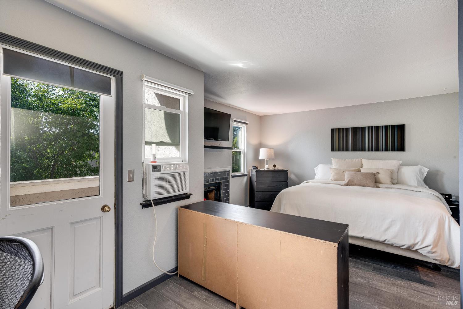 30 Fredrick Drive Rohnert Park, CA 94928 - Photo 25 of 41 Spacious primary bedroom with fireplace and natural light