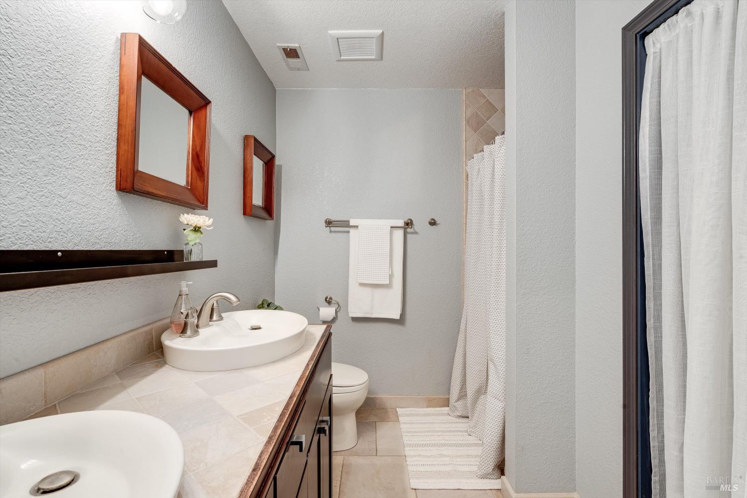 30 Fredrick Drive Rohnert Park, CA 94928 - Photo 30 of 41 Remodeled primary bathroom with dual sinks and updated finishes