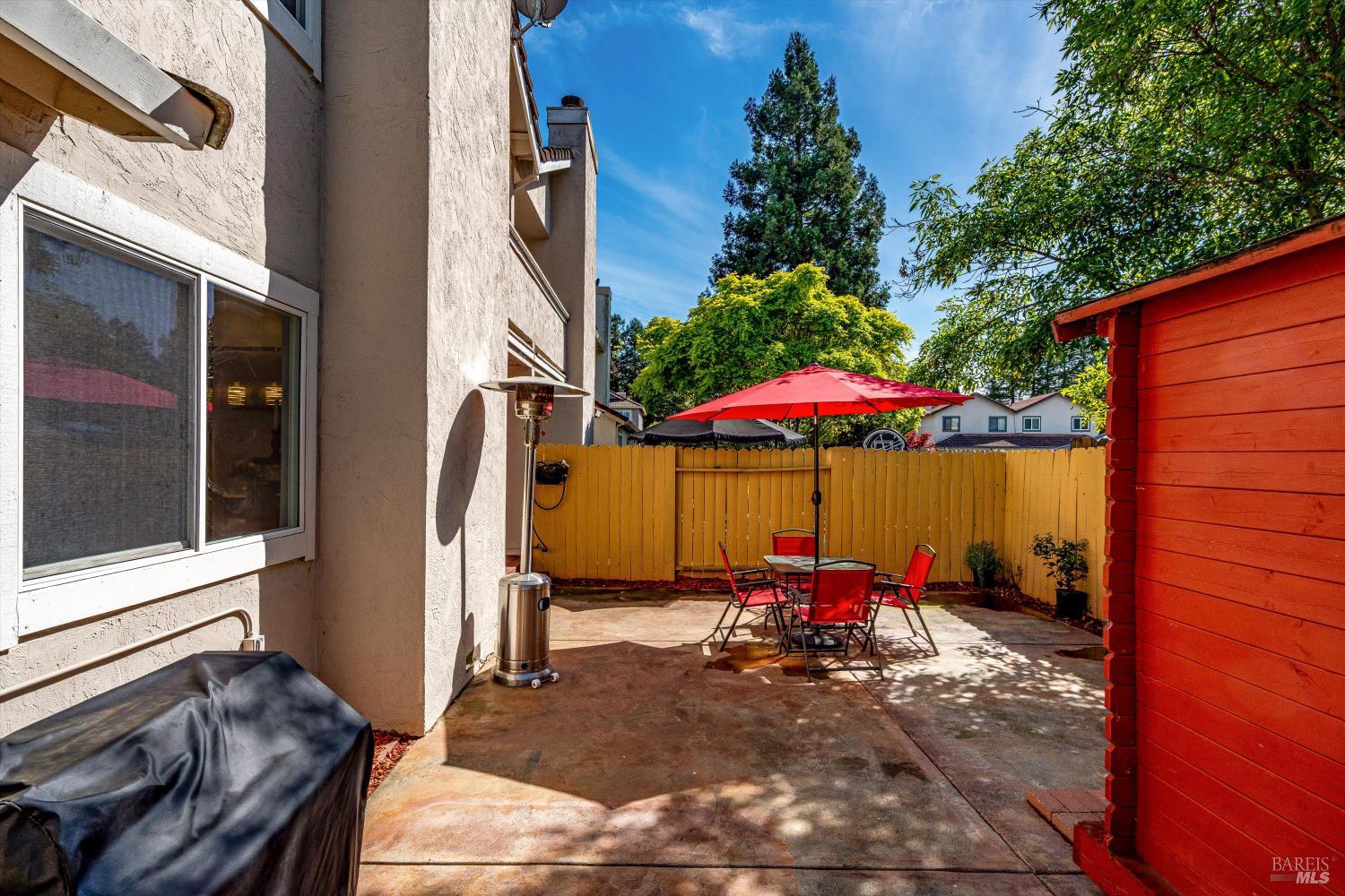 30 Fredrick Drive Rohnert Park, CA 94928 - Photo 39 of 41 Backyard with patio, seating, and mature landscaping