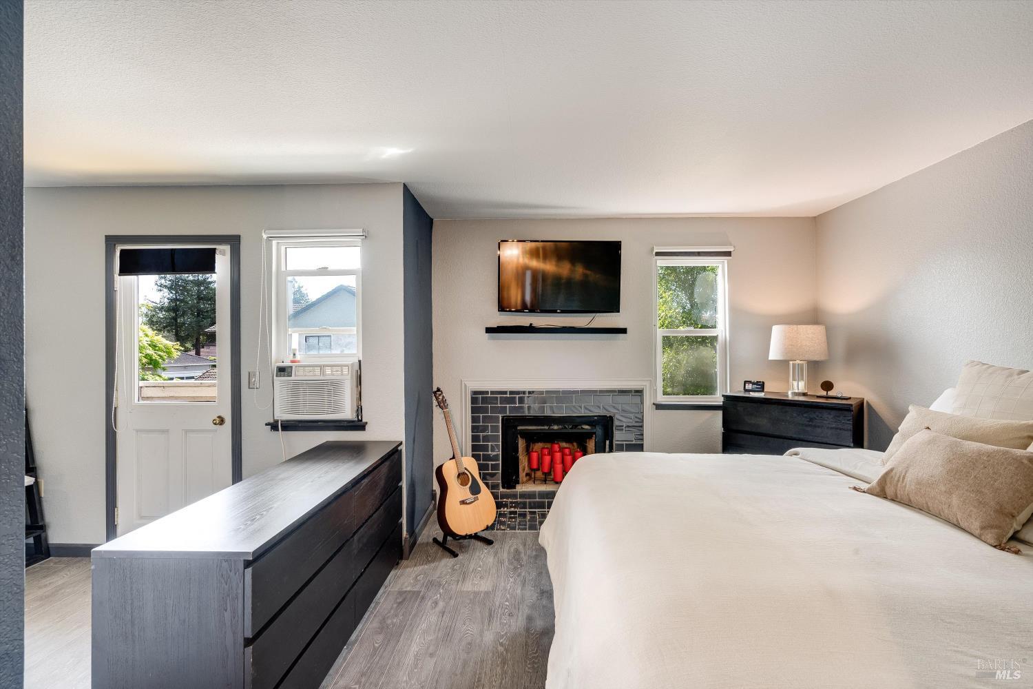 30 Fredrick Drive Rohnert Park, CA 94928 - Photo 4 of 41 Primary bedroom retreat with fireplace and private deck access