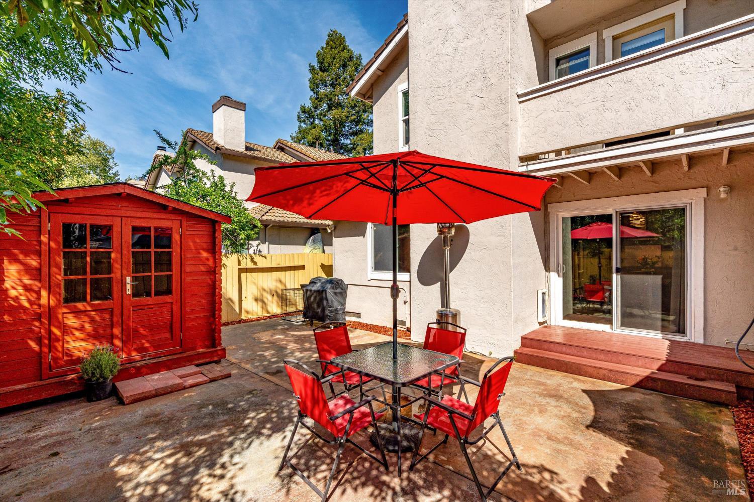 30 Fredrick Drive Rohnert Park, CA 94928 - Photo 5 of 41 Private backyard patio with dining area and storage shed—perfect for entertaining