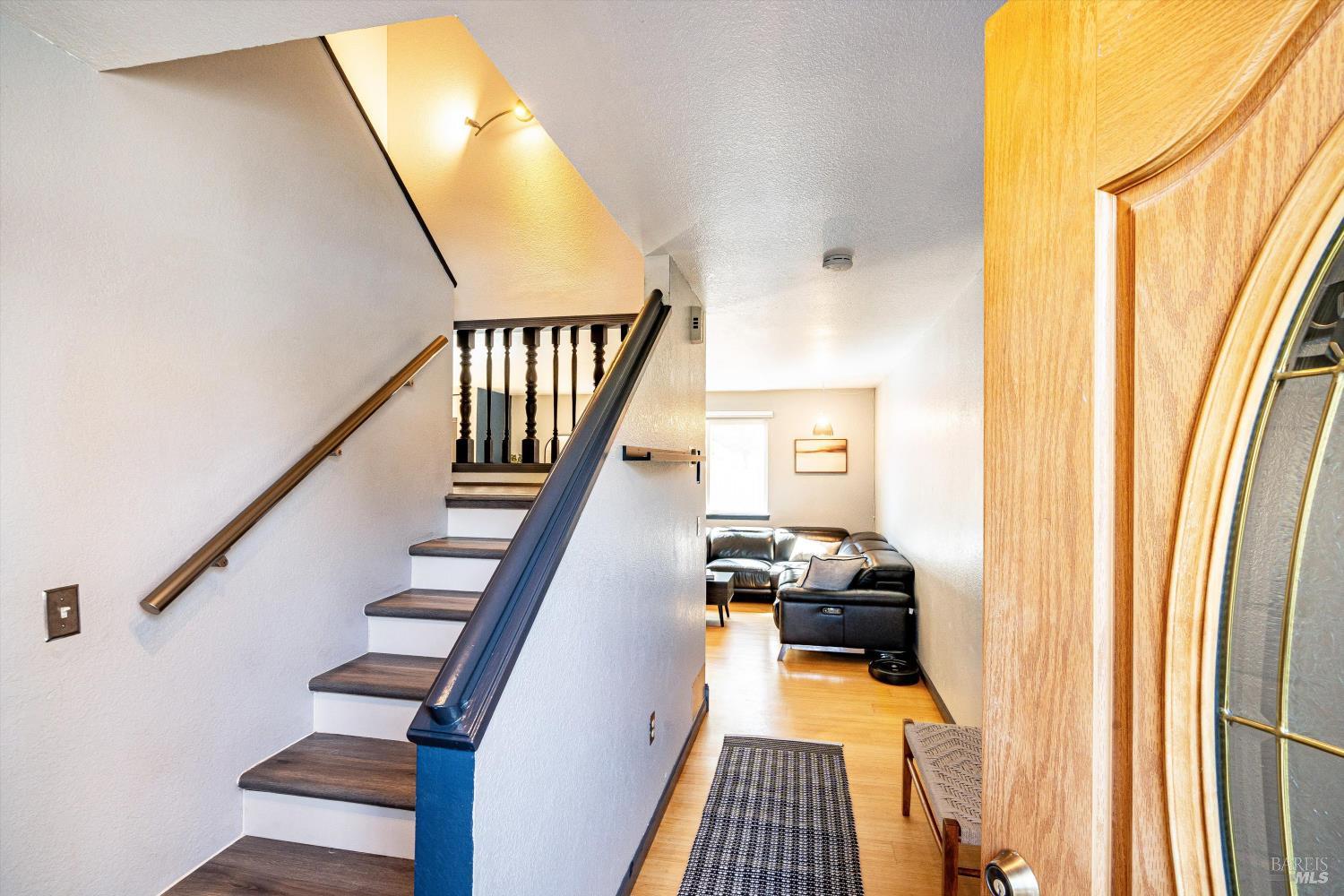 30 Fredrick Drive Rohnert Park, CA 94928 - Photo 7 of 41 Light-filled entryway with updated flooring and staircase