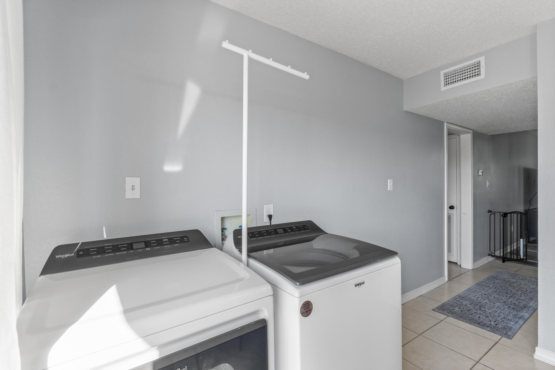 210 Pelham Road, Unit 220A Fort Walton Beach, FL 32547 - Photo 14 of 38 a utility room with dryer and washer