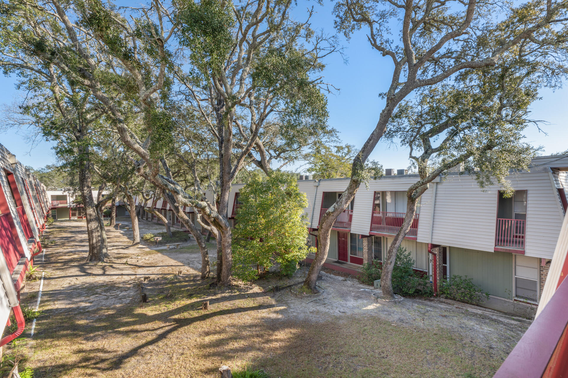210 Pelham Road, Unit 220A Fort Walton Beach, FL 32547 - Photo 26 of 38 a view of a house with a yard