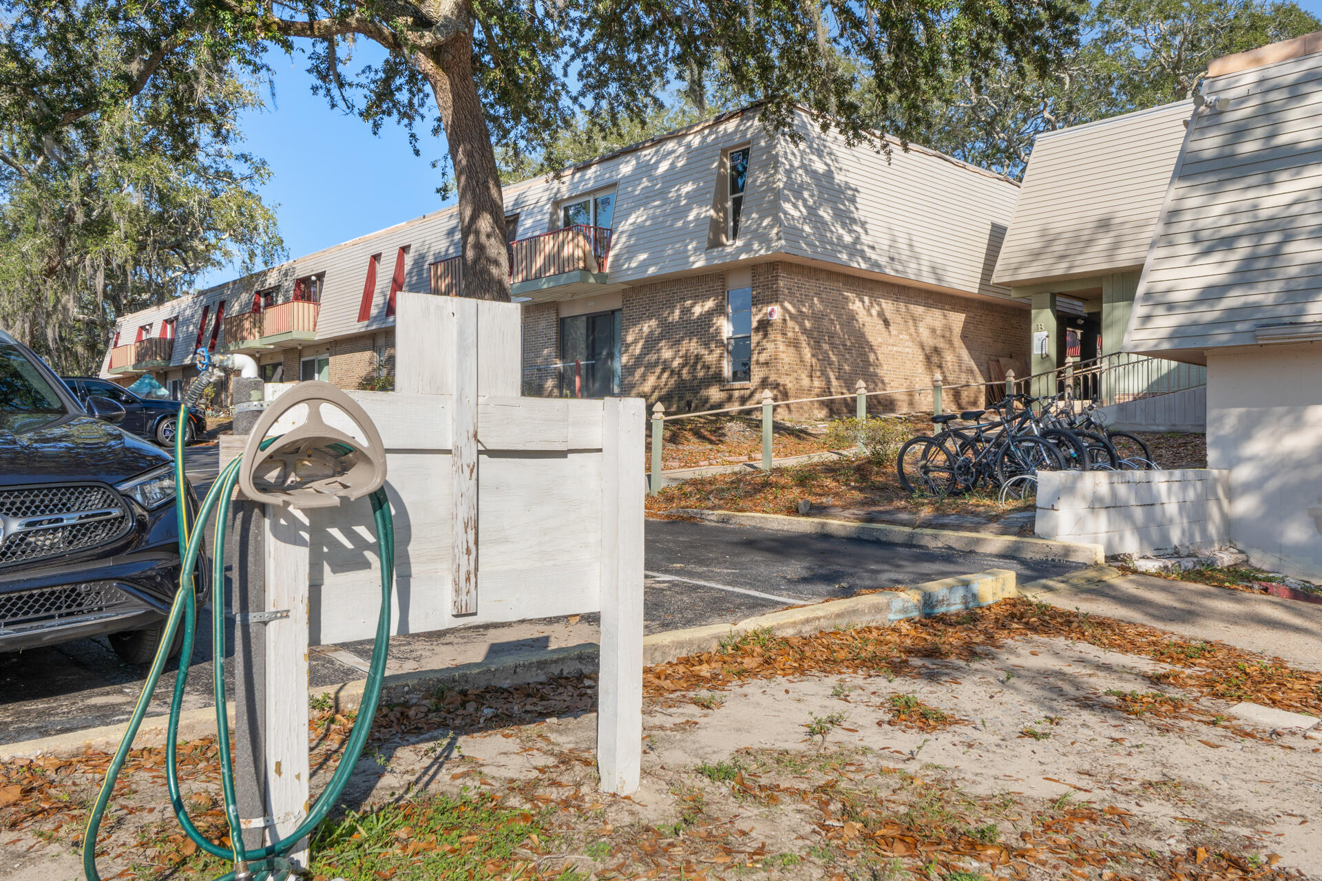 210 Pelham Road, Unit 220A Fort Walton Beach, FL 32547 - Photo 28 of 38 a view of a house with a park