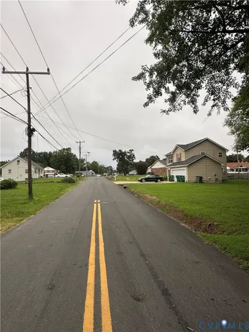 a view of a street with houses