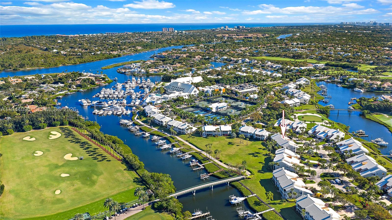 1602 Captains Way Jupiter, FL 33477 - Photo 15 of 35 an aerial view of residential houses with outdoor space