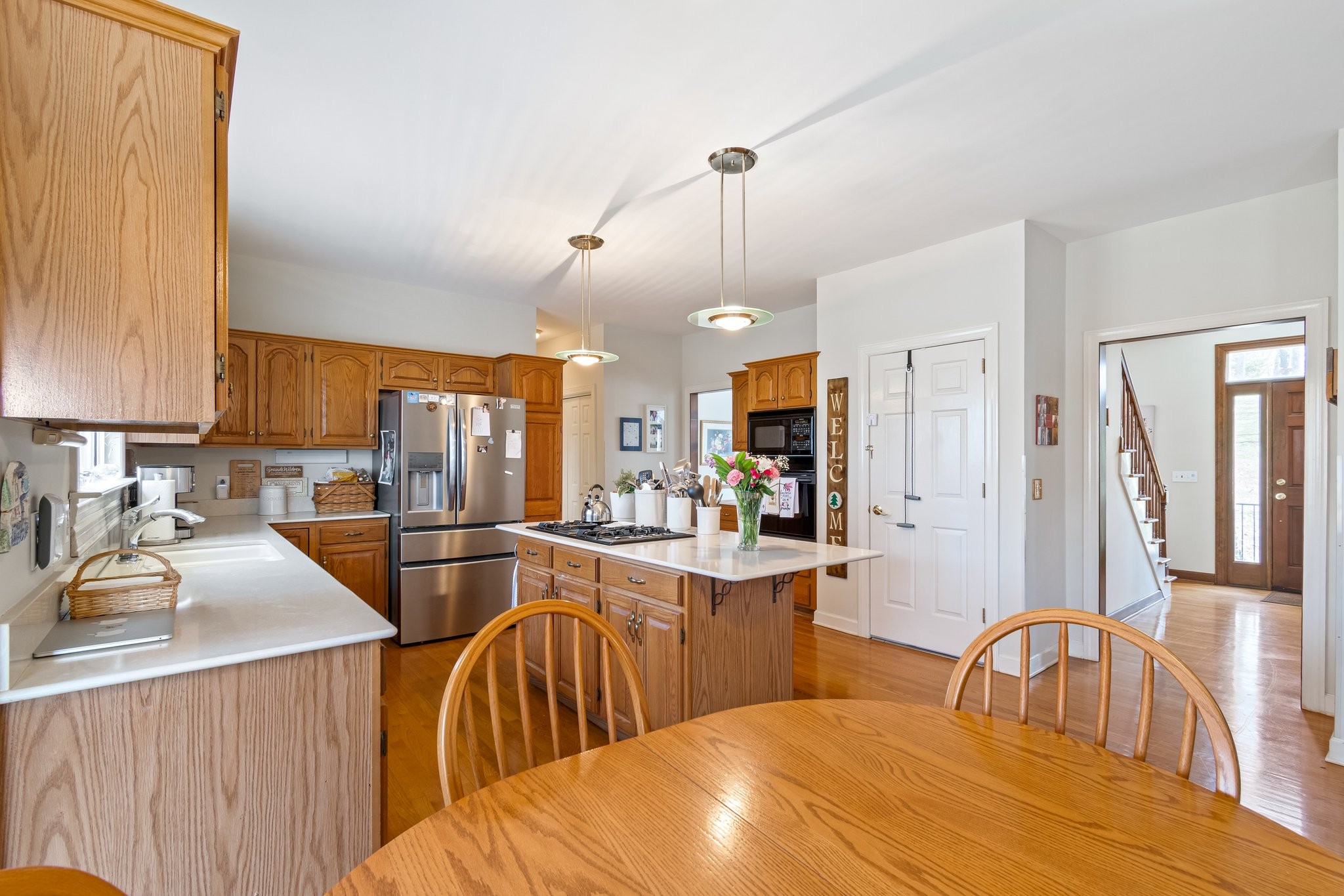 4259 Warren Road Franklin, TN 37067 - Photo 20 of 53 a kitchen with stainless steel appliances a sink stove and cabinets