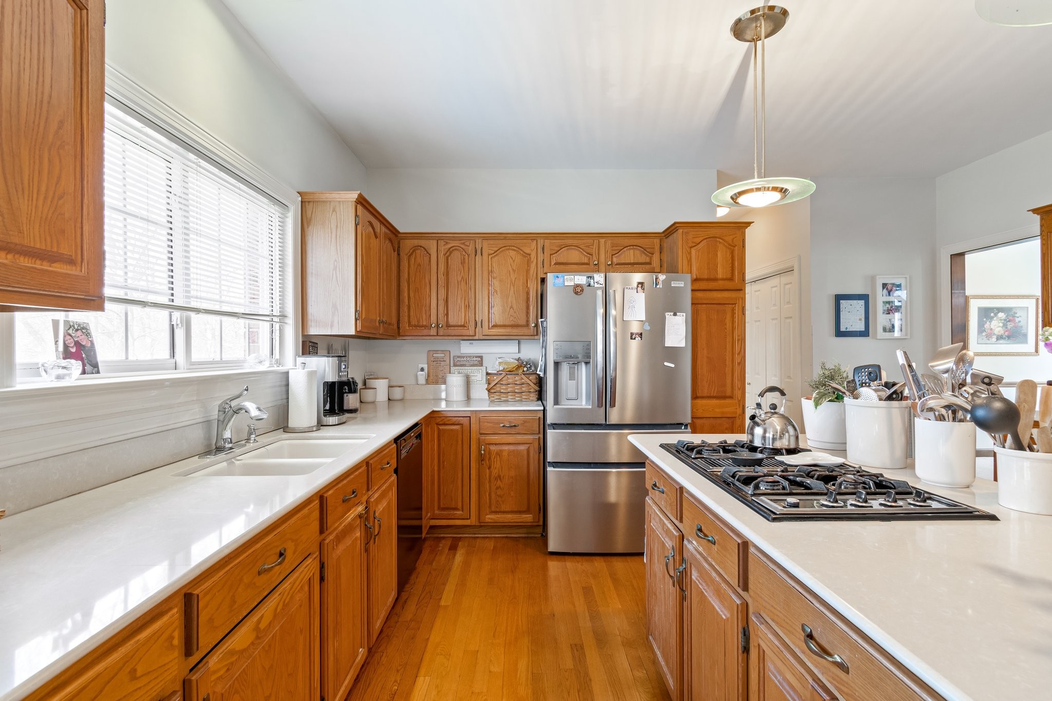 4259 Warren Road Franklin, TN 37067 - Photo 21 of 53 a kitchen with stainless steel appliances a sink stove and refrigerator