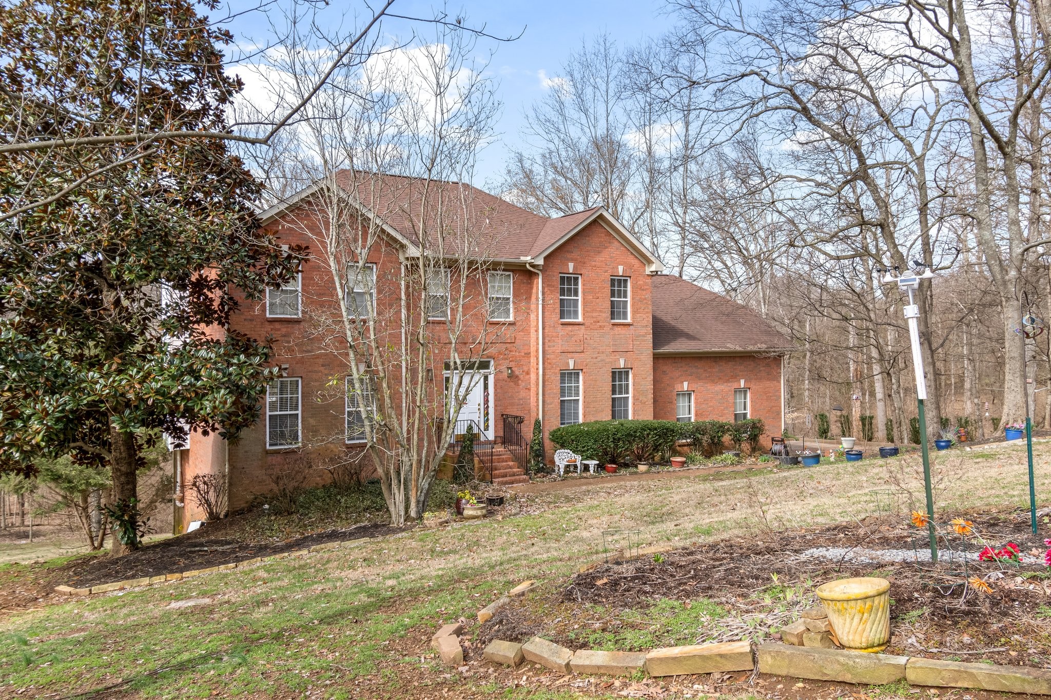 4259 Warren Road Franklin, TN 37067 - Photo 3 of 53 a front view of a house with a yard