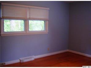 3922 Fellsway Road Charlotte, NC 28209 - Photo 11 of 16 an empty room with a window