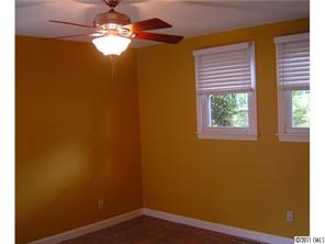 3922 Fellsway Road Charlotte, NC 28209 - Photo 10 of 16 a view of a small space with wooden floor and a window