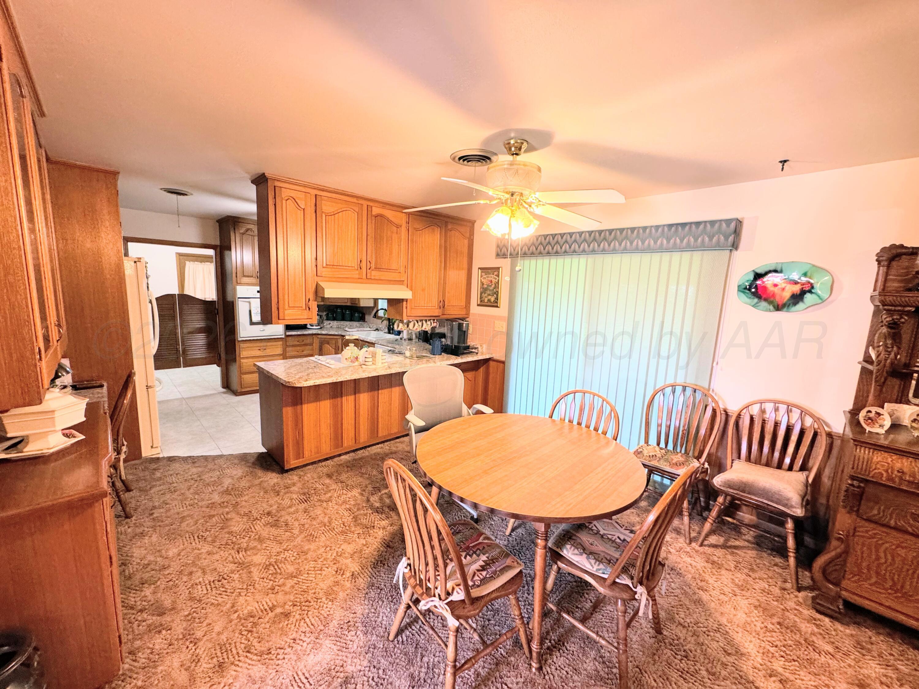 420 South Roland Street Spearman, TX 79081 - Photo 6 of 26 420 S Roland dining area