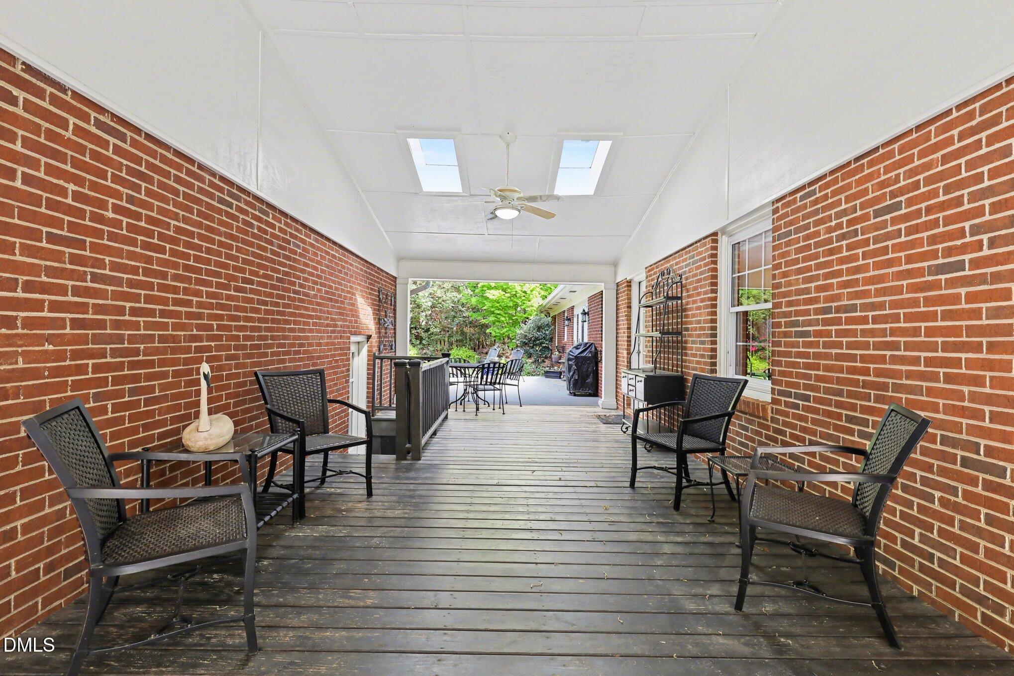 1212 Kershaw Drive Raleigh, NC 27609 - Photo 32 of 42 Breezeway to detached living space & Garage.