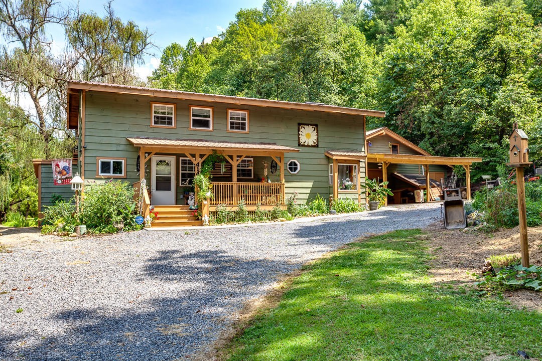4142 Wilhite Road Sevierville, TN 37876 - Photo 1 of 33 front view of a house with a yard