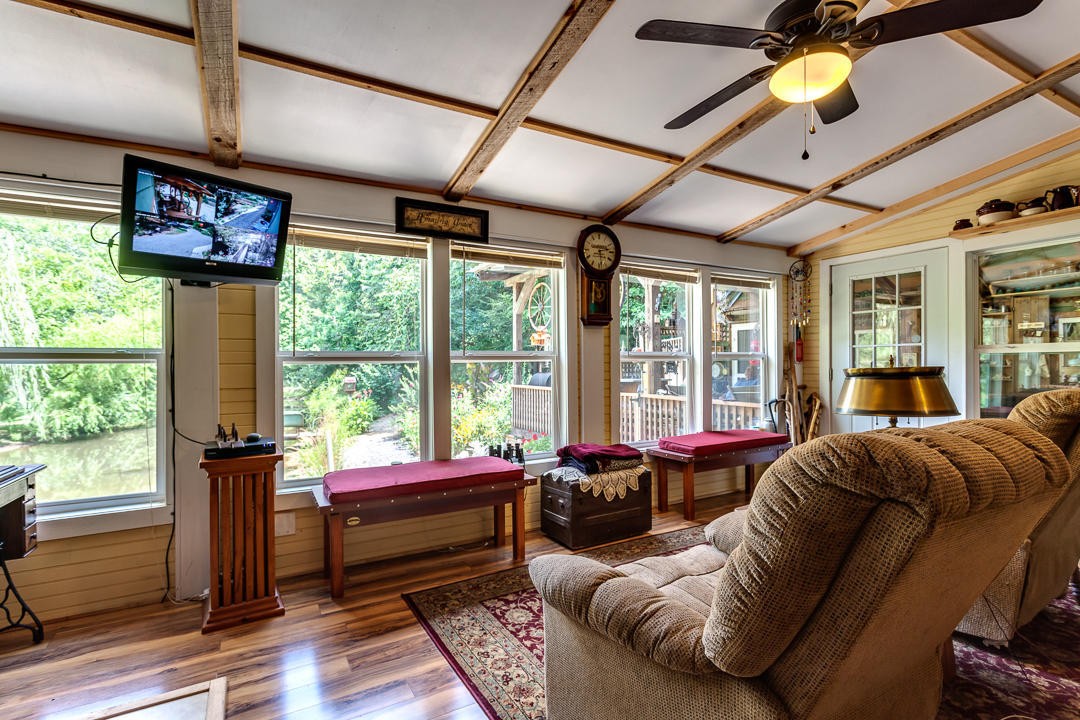 4142 Wilhite Road Sevierville, TN 37876 - Photo 14 of 33 a living room with furniture and large windows