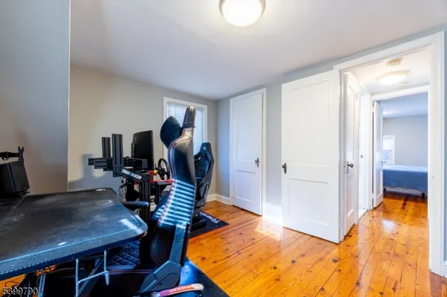 a room with furniture and a flat screen tv