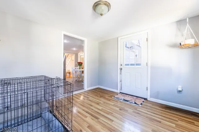 a bedroom with a bed and a table