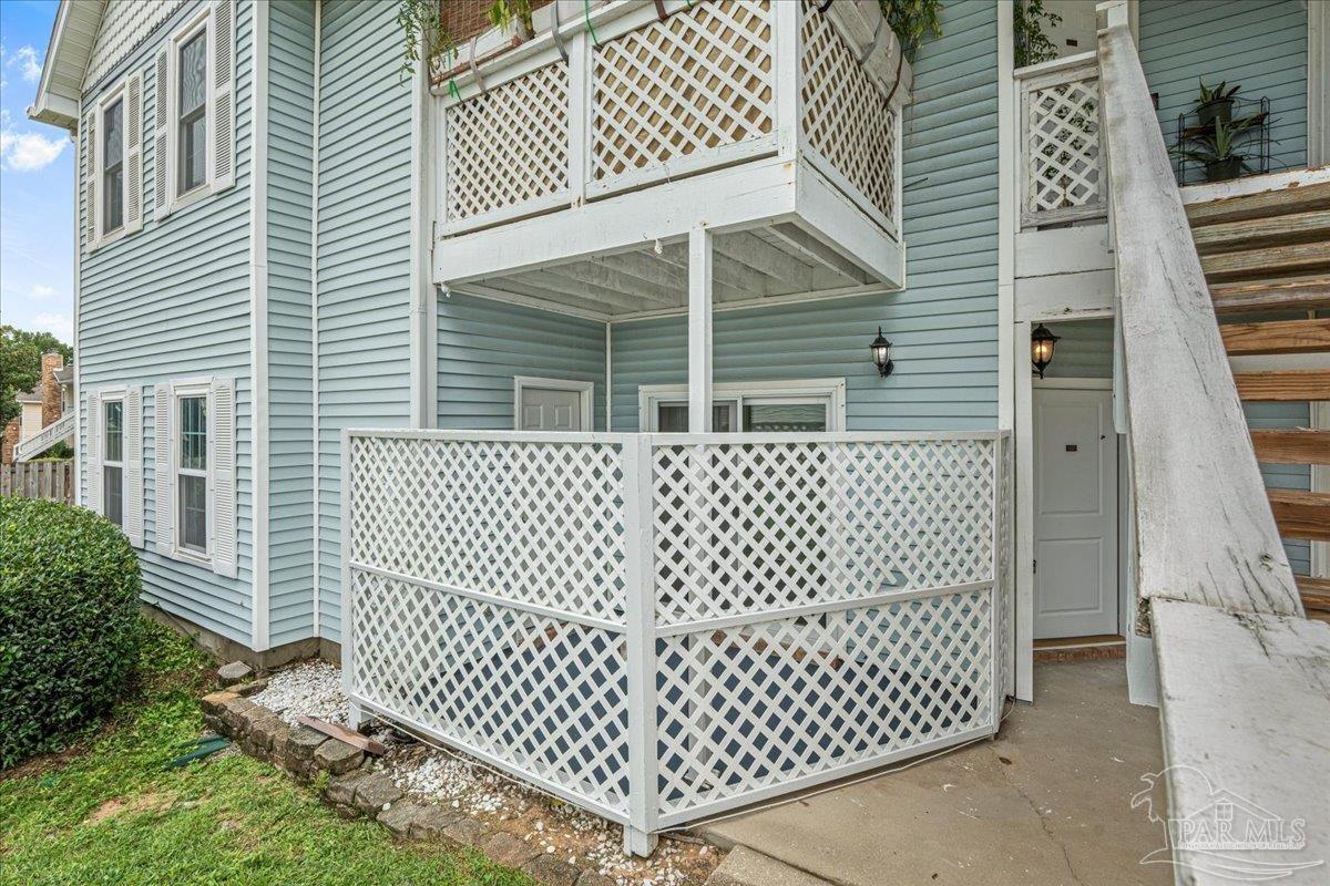 601 East Burgess Road, Unit C3 Pensacola, FL 32504 - Photo 30 of 35 a backyard of a house with wooden fence