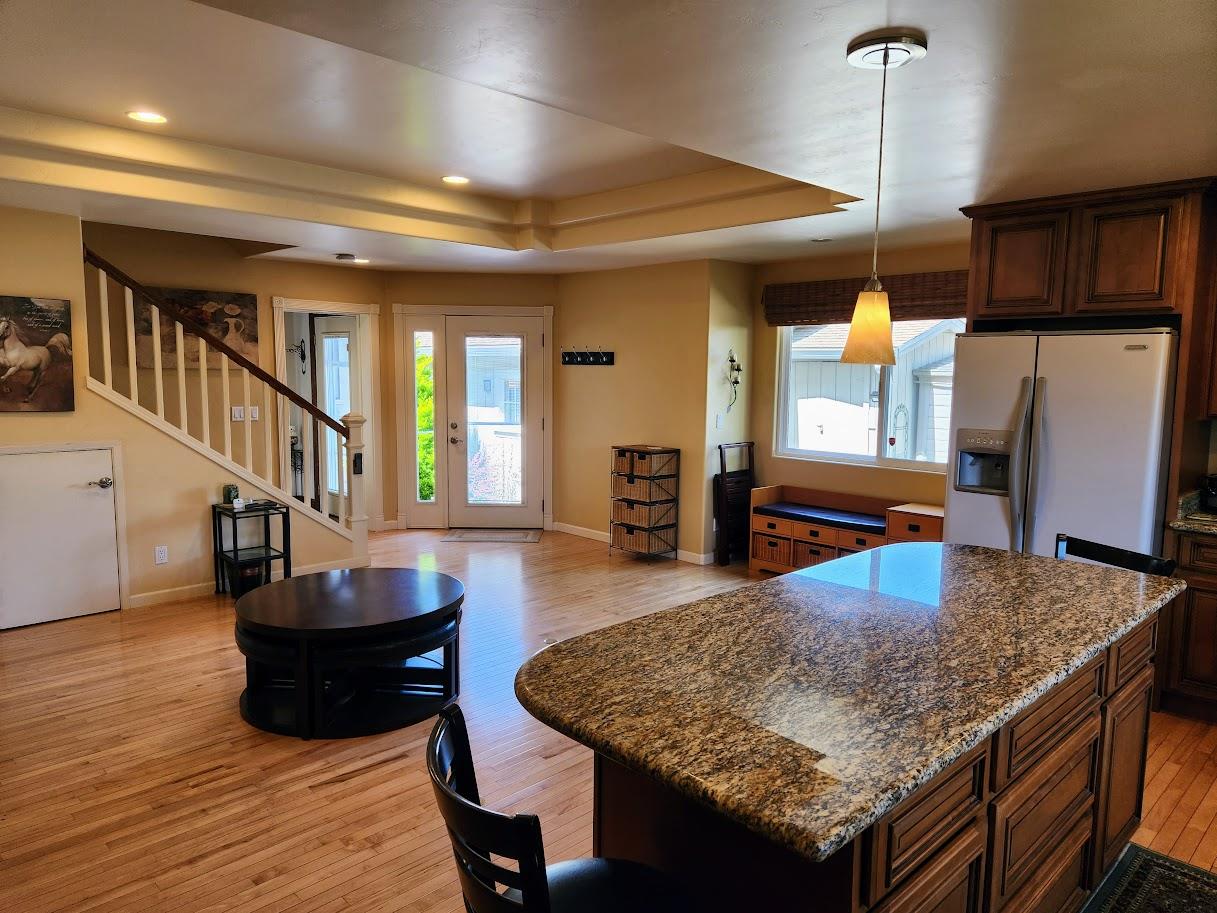 45 Chestnut Street Salinas, CA 93901 - Photo 12 of 23 a kitchen with kitchen island a counter top space a sink appliances and cabinets