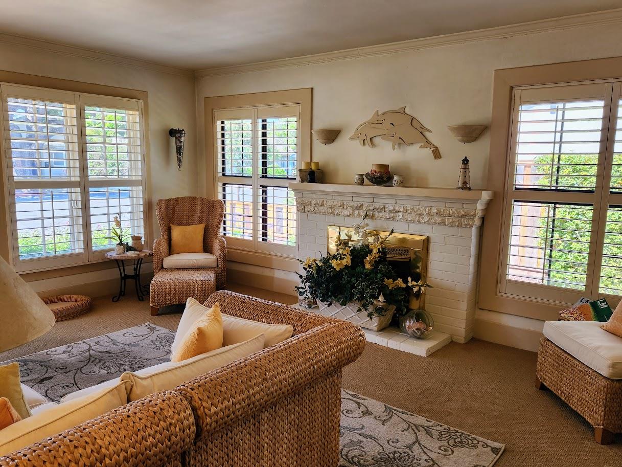 45 Chestnut Street Salinas, CA 93901 - Photo 3 of 23 a living room with furniture and a fireplace