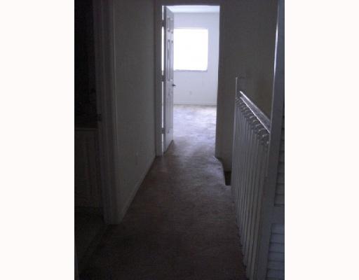 1920 Hibiscus Lane, Unit 163 Riviera Beach, FL 33404 - Photo 14 of 16 a view of a hallway