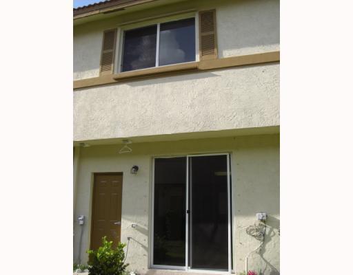 1920 Hibiscus Lane, Unit 163 Riviera Beach, FL 33404 - Photo 15 of 16 a view of front door