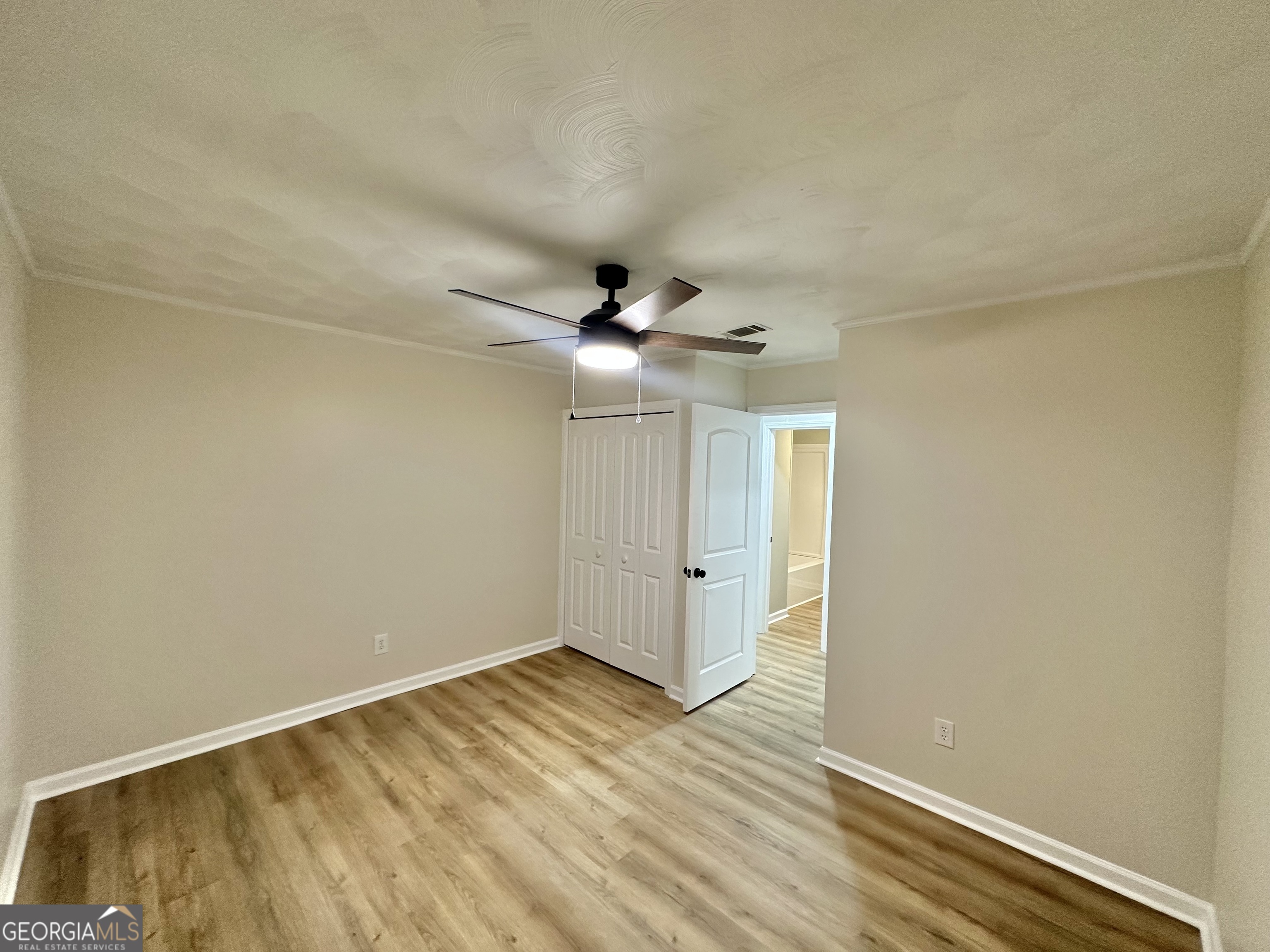 72 10th Street McRae-Helena, GA 31037 - Photo 15 of 26 wooden floor in an empty room
