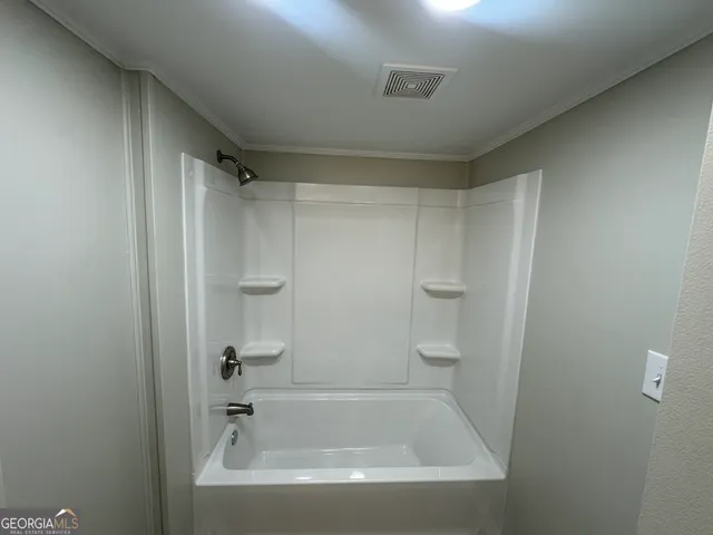 a bathroom with a bathtub